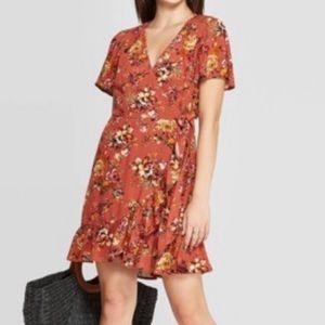 Orange floral wrap dress with ruffle detail